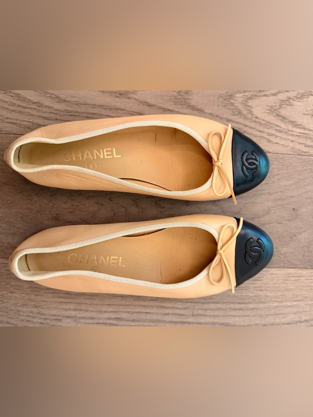 CHANEL Beige and Black Cap-Toe Ballet Flats Authentic